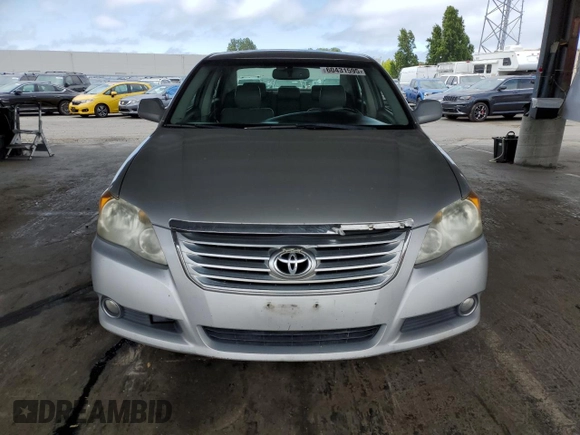 2008 Toyota Avalon XL z VIN 4T1BK36B28U321261, wystawiony jako Copart lot #60431595 z przebiegiem 178 799 mil mil oraz Czysty tytuł • Clean title. Historia ofert i sprzedaży dostępna na DreamBid. Obrazek 5.