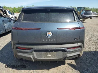 2023 Fisker Ocean One z VIN VCF1ZBU29PG004499, wystawiony jako Copart lot #55474415 z przebiegiem 14 190 mil mil oraz Szkoda całkowita • Salvage title. Historia ofert i sprzedaży dostępna na DreamBid. Obrazek 6.