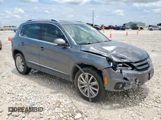 2014 Volkswagen Tiguan SEL с VIN WVGAV3AX7EW506170, выставлен на аукционе Copart как лот 58852355 с пробегом 55 961 миль миль и Списание • Salvage title. История ставок и продаж доступна на DreamBid. Изображение 4.
