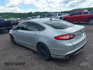 2014 Ford Fusion SE with VIN 3FA6P0H93ER299697, listed as a IAAI auction lot 42139387 with Not Provided miles and . Bid and sale history available at carsss.com. Image 3.