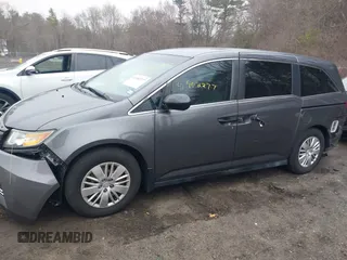 2014 Honda Odyssey LX z VIN 5FNRL5H2XEB009962, wystawiony jako IAAI lot #41902277 z przebiegiem 152 661 mil mil oraz . Historia ofert i sprzedaży dostępna na DreamBid. Obrazek 15.