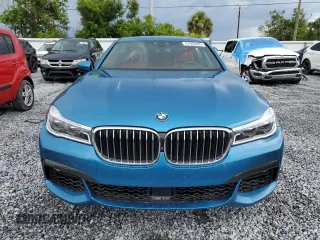 2019 BMW 7 Series 750i z VIN WBA7F0C51KGM25707, wystawiony jako Copart lot #61950495 z przebiegiem 56 768 mil mil oraz Nie do naprawy • Non repairable. Historia ofert i sprzedaży dostępna na DreamBid. Obrazek 5.