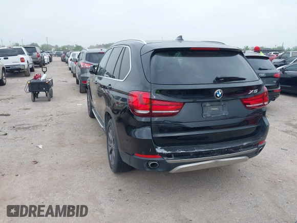 2014 BMW X5 xDrive35d with VIN 5UXKS4C56E0J93861, listed as a IAAI auction lot 41906775 with 149,263 mi miles. Bid and sale history available at carsss.com. Image 3.