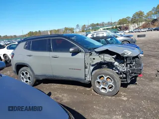 2022 Jeep Compass Trailhawk with VIN 3C4NJDDB4NT136213, listed as a IAAI auction lot 41689612 with 50,091 mi miles and . Bid and sale history available at DreamBid. Image 13.