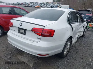 2015 Volkswagen Jetta Sedan 1.8T SE with VIN 3VWD17AJ6FM237674, listed as a IAAI auction lot 41613054 with 71,325 mi miles. Bid and sale history available at carsss.com. Image 4.