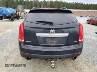 2014 Cadillac SRX Premium Collection z VIN 3GYFNGE3XES577569, wystawiony jako Copart lot #48399735 z przebiegiem Nie podano mil oraz Szkoda całkowita • Salvage title. Historia ofert i sprzedaży dostępna na DreamBid. Obrazek 6.