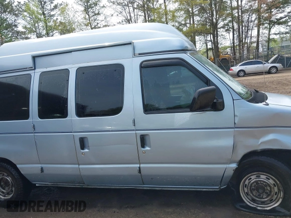 1999 Ford Econoline Passenger XL z VIN 1FMRE112XXHA78677, wystawiony jako IAAI lot #41973782 z przebiegiem 142 051 mil mil oraz . Historia ofert i sprzedaży dostępna na DreamBid. Obrazek 13.
