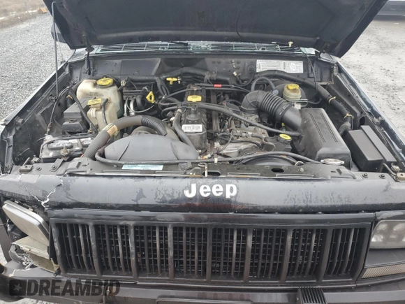 1996 Jeep Cherokee Sport with VIN 1J4FJ68S0TL288244, listed as a Copart auction lot 87801025 with 218,356 mi miles and Salvage Title. Bid and sale history available at carsss.com. Image 13.