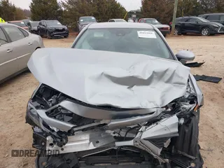 2024 Toyota Camry SE z VIN 4T1G11AK2RU211798, wystawiony jako IAAI lot #41613966 z przebiegiem 32 689 mil mil oraz . Historia ofert i sprzedaży dostępna na DreamBid. Obrazek 13.