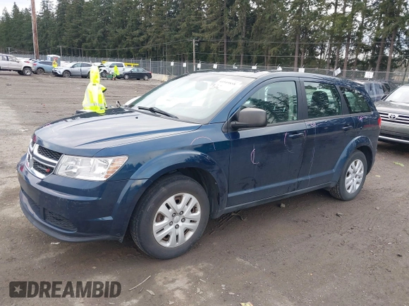 2014 Dodge Journey American Value Pkg with VIN 3C4PDCAB4ET149493, listed as a IAAI auction lot 41549858 with 117,905 mi miles. Bid and sale history available at carsss.com. Image 2.