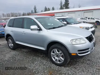 2006 Volkswagen Touareg 4.2L V8 z VIN WVGZM77L06D043948, wystawiony jako IAAI lot #41839431 z przebiegiem 207 496 mil mil oraz . Historia ofert i sprzedaży dostępna na DreamBid. Obrazek 13.