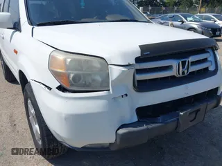 2008 Honda Pilot EX-L with VIN 5FNYF18568B025960, listed as a IAAI auction lot 42100571 with 206,437 mi miles. Bid and sale history available at carsss.com. Image 6.