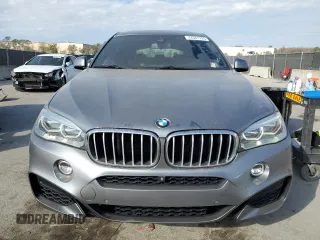 2016 BMW X6 xDrive50i with VIN 5UXKU6C5XG0R34151, listed as a Copart auction lot 44387725 with 158,088 mi miles and Clean Title. Bid and sale history available at carsss.com. Image 5.
