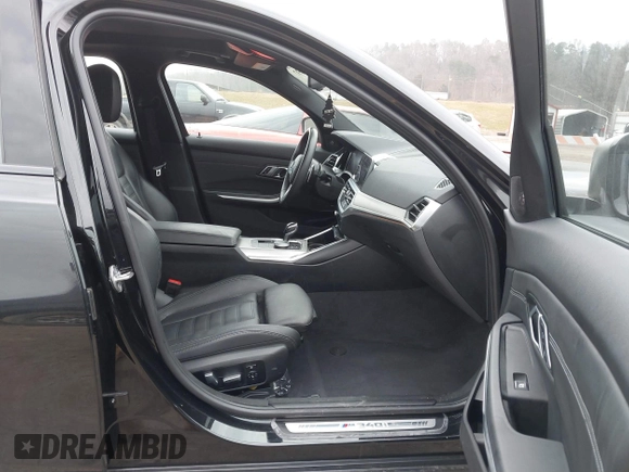 2020 BMW 3 Series M340i with VIN WBA5U7C02LAF54184, listed as a IAAI auction lot 41490697 with 57,363 mi miles. Bid and sale history available at carsss.com. Image 5.