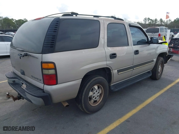 2004 Chevrolet Tahoe LT with VIN 1GNEC13Z34J258811, listed as a IAAI auction lot 41710156 with 322,462 mi miles. Bid and sale history available at carsss.com. Image 4.