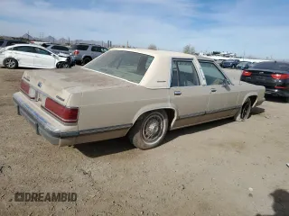 1991 Mercury Grand Marquis z VIN 2MECM75FXMX633893, wystawiony jako Copart lot #87439324 z przebiegiem 65 046 mil mil oraz Tytuł czysty. Historia ofert i sprzedaży dostępna na DreamBid. Obrazek 3.