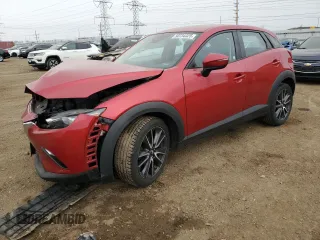 2018 Mazda CX-3 Touring with VIN JM1DKDC77J0329338, listed as a Copart auction lot 50734325 with 94,733 mi miles and Salvage Title. Bid and sale history available at carsss.com. Image 1.