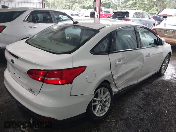 2016 Ford Focus SE с VIN 1FADP3F22GL211156, выставлен на аукционе IAAI как лот 42502613 с пробегом 121 224 миль миль и . История ставок и продаж доступна на DreamBid. Изображение 4.