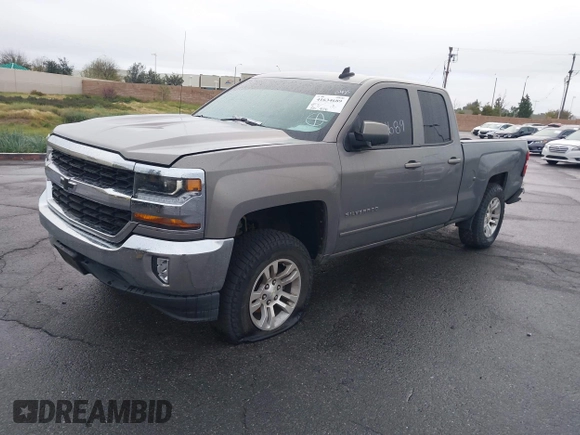 2017 Chevrolet Silverado 1500 LT with VIN 1GCRCRECXHZ159962, listed as a IAAI auction lot 41634689 with 145,978 mi miles and . Bid and sale history available at DreamBid. Image 2.