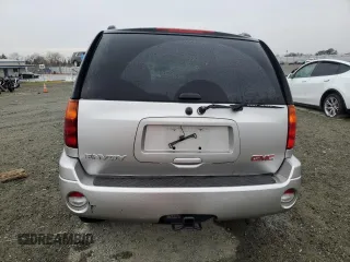 2004 GMC Envoy SLE with VIN 1GKDS13S142358446, listed as a Copart auction lot 43383935 with 154,358 mi miles and Salvage Title. Bid and sale history available at carsss.com. Image 6.