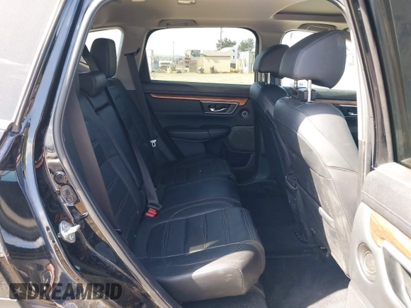 2021 Honda CR-V Touring with VIN 2HKRW2H96MH681908, listed as a IAAI auction lot 42082535 with 65,570 mi miles and . Bid and sale history available at DreamBid. Image 8.