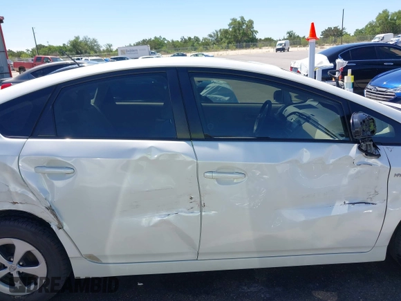 2012 Toyota Prius One with VIN JTDKN3DU0C5499494, listed as a IAAI auction lot 42071966 with 99,805 mi miles and . Bid and sale history available at DreamBid. Image 13.