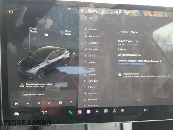2024 Tesla Model Y with VIN 7SAYGDED1RA321691, listed as a Copart auction lot 52153945 with 7,544 mi miles and Salvage Title. Bid and sale history available at DreamBid. Image 9.