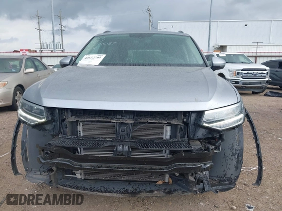 2023 Volkswagen Tiguan S with VIN 3VVRB7AX4PM015440, listed as a IAAI auction lot 42132705 with 37,482 mi miles and . Bid and sale history available at DreamBid. Image 13.