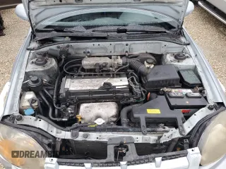 2005 Hyundai Accent GLS with VIN KMHCG35C75U354574, listed as a Copart auction lot 74931444 with 141,013 mi miles and Salvage Title. Bid and sale history available at carsss.com. Image 11.