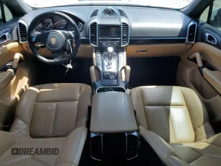 2014 Porsche Cayenne with VIN WP1AA2A28ELA09742, listed as a Copart auction lot 61779285 with 182,380 mi miles and Salvage title. Bid and sale history available at DreamBid. Image 8.