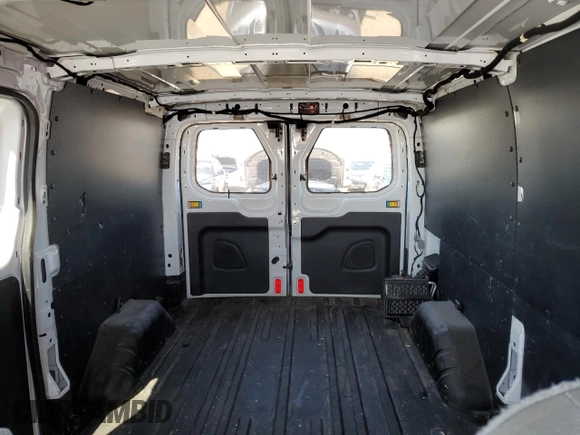 2015 Ford Transit Cargo z VIN 1FTNE1ZM4FKA87207, wystawiony jako Copart lot #58417895 z przebiegiem 184 537 mil mil oraz Nie do naprawy • Non repairable. Historia ofert i sprzedaży dostępna na DreamBid. Obrazek 10.