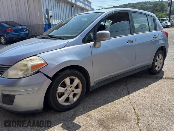 2009 Nissan Versa S with VIN 3N1BC13E99L412868, listed as a Copart auction lot 55990665 with 214,080 mi miles and Clean Title. Bid and sale history available at DreamBid. Image 2.