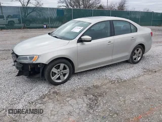 2012 Volkswagen Jetta TDI w/Premium with VIN 3VWLL7AJ2CM317216, listed as a IAAI auction lot 41731204 with 320,474 mi miles and . Bid and sale history available at DreamBid. Image 2.