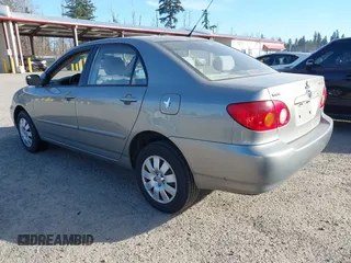 2004 Toyota Corolla CE with VIN JTDBR38E842043849, listed as a IAAI auction lot 41703290 with 299,999 mi miles. Bid and sale history available at carsss.com. Image 3.