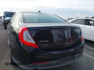 2013 Lincoln MKS with VIN 1LNHL9DK6DG608673, listed as a IAAI auction lot 42756289 with 103,118 mi miles and . Bid and sale history available at DreamBid. Image 16.