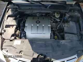 2008 Cadillac DTS 1SA z VIN 1G6KD57Y28U136336, wystawiony jako Copart lot #64738033 z przebiegiem 189 496 mil mil oraz Szkoda całkowita • Salvage title. Historia ofert i sprzedaży dostępna na DreamBid. Obrazek 11.
