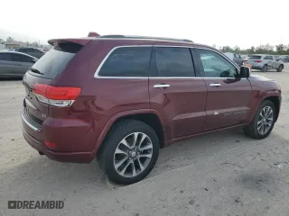 2017 Jeep Grand Cherokee Overland with VIN 1C4RJECG3HC868255, listed as a Copart auction lot 83041054 with 121,604 mi miles and Salvage Title. Bid and sale history available at carsss.com. Image 3.
