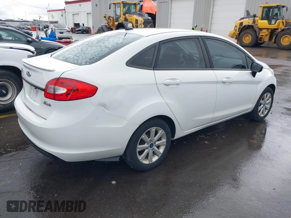 2012 Ford Fiesta SE with VIN 3FADP4BJ8CM102695, listed as a IAAI auction lot 41734833 with 131,779 mi miles. Bid and sale history available at carsss.com. Image 4.