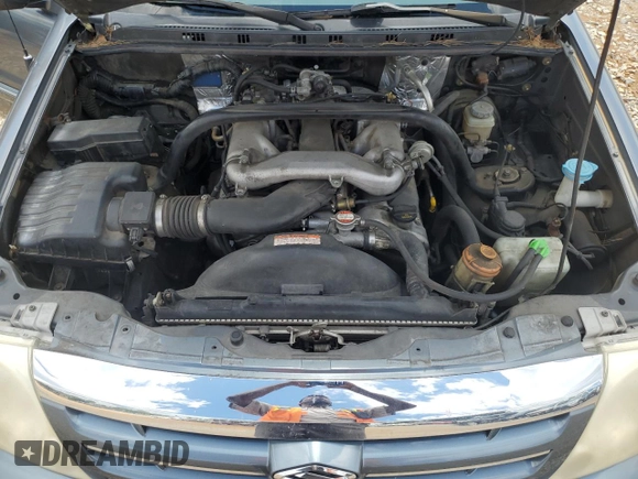 2005 Suzuki XL7 LX z VIN JS3TY92VX54102488, wystawiony jako Copart lot #56700595 z przebiegiem 169 827 mil mil oraz Szkoda całkowita • Salvage title. Historia ofert i sprzedaży dostępna na DreamBid. Obrazek 12.