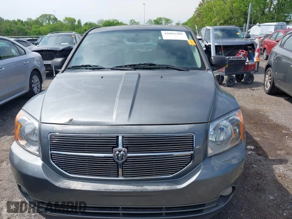 2011 Dodge Caliber Mainstreet with VIN 1B3CB3HA1BD247594, listed as a IAAI auction lot 42082305 with 122,438 mi miles. Bid and sale history available at carsss.com. Image 6.