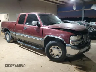 2000 GMC New Sierra 1500 SLE with VIN 1GTEK19T3YE218791, listed as a Copart auction lot 82482734 with 242,277 mi miles and Salvage Title. Bid and sale history available at carsss.com. Image 4.