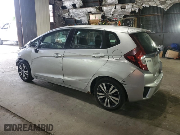 2015 Honda Fit EX-L with VIN 3HGGK5H86FM754172, listed as a Copart auction lot 60870975 with 74,377 mi miles and Salvage title. Bid and sale history available at DreamBid. Image 2.