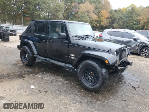 2008 Jeep Wrangler Unlimited Sahara with VIN 1J4GA59148L574934, listed as a Copart auction lot 74590164 with 134,674 mi miles and Salvage title. Bid and sale history available at DreamBid. Image 4.