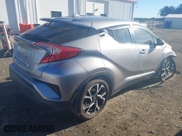 2018 Toyota C-HR XLE with VIN NMTKHMBX3JR048303, listed as a IAAI auction lot 41695246 with 125,081 mi miles. Bid and sale history available at carsss.com. Image 4.