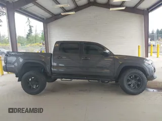 2019 Toyota Tacoma SR z VIN 3TMCZ5AN1KM257081, wystawiony jako IAAI lot #42211385 z przebiegiem 60 229 mil mil oraz . Historia ofert i sprzedaży dostępna na DreamBid. Obrazek 14.