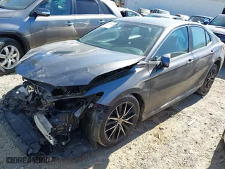 2021 Toyota Camry SE Nightshade with VIN 4T1G11AK1MU515861, listed as a IAAI auction lot 41676074 with 107,380 mi miles. Bid and sale history available at carsss.com. Image 2.