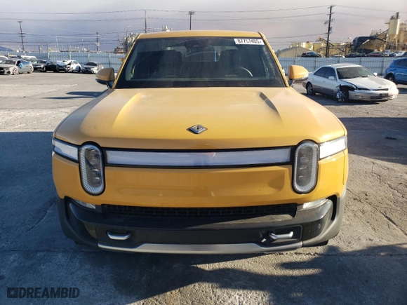 2022 Rivian R1T Adventure Package with VIN 7FCTGAAA2NN005811, listed as a Copart auction lot 87757405 with 21,336 mi miles and Salvage Title. Bid and sale history available at carsss.com. Image 5.