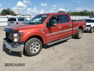 2023 Ford F-150 XL with VIN 1FTEW1C59PKE45157, listed as a Copart auction lot 61329115 with 12,002 mi miles and Salvage title. Bid and sale history available at DreamBid. Image 1.