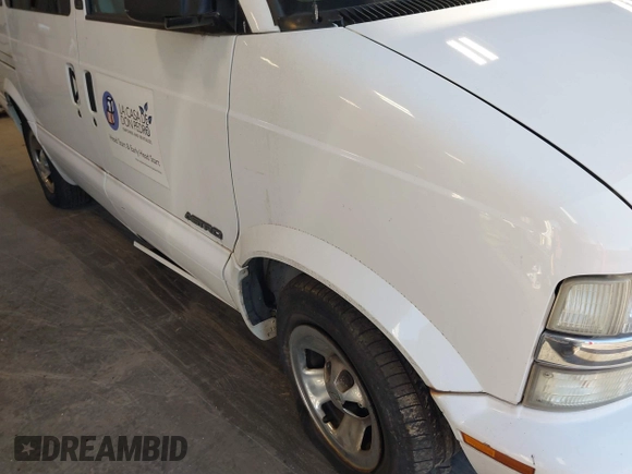 2002 Chevrolet Astro with VIN 1GNDM19X32B146063, listed as a IAAI auction lot 41595819 with 77,364 mi miles. Bid and sale history available at carsss.com. Image 6.