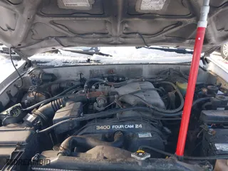 1998 Toyota 4Runner Limited with VIN JT3HN87R2W0184698, listed as a IAAI auction lot 41710285 with 176,068 mi miles. Bid and sale history available at carsss.com. Image 10.
